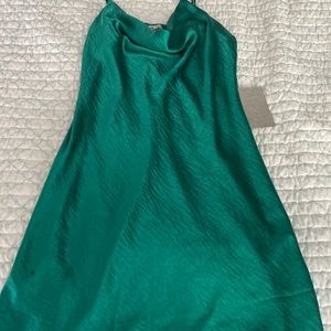 Emerald green justify slip dress. new never worn, size small.